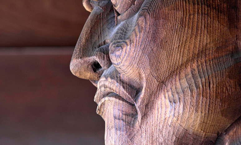 「を」と「で」